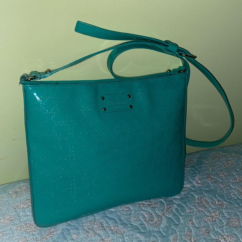 Kate Spade “Metro Darby” crossbody Bag.
